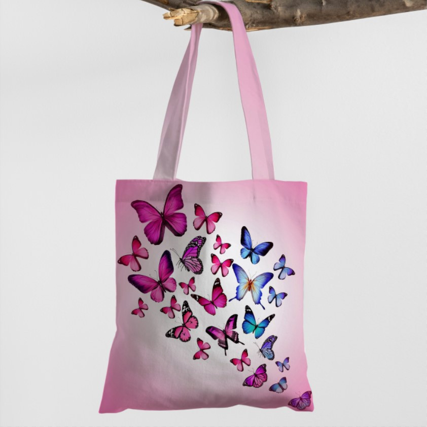 Сумка шопер еко "Метелики малюнок політ різнокольорові фон рожевий"